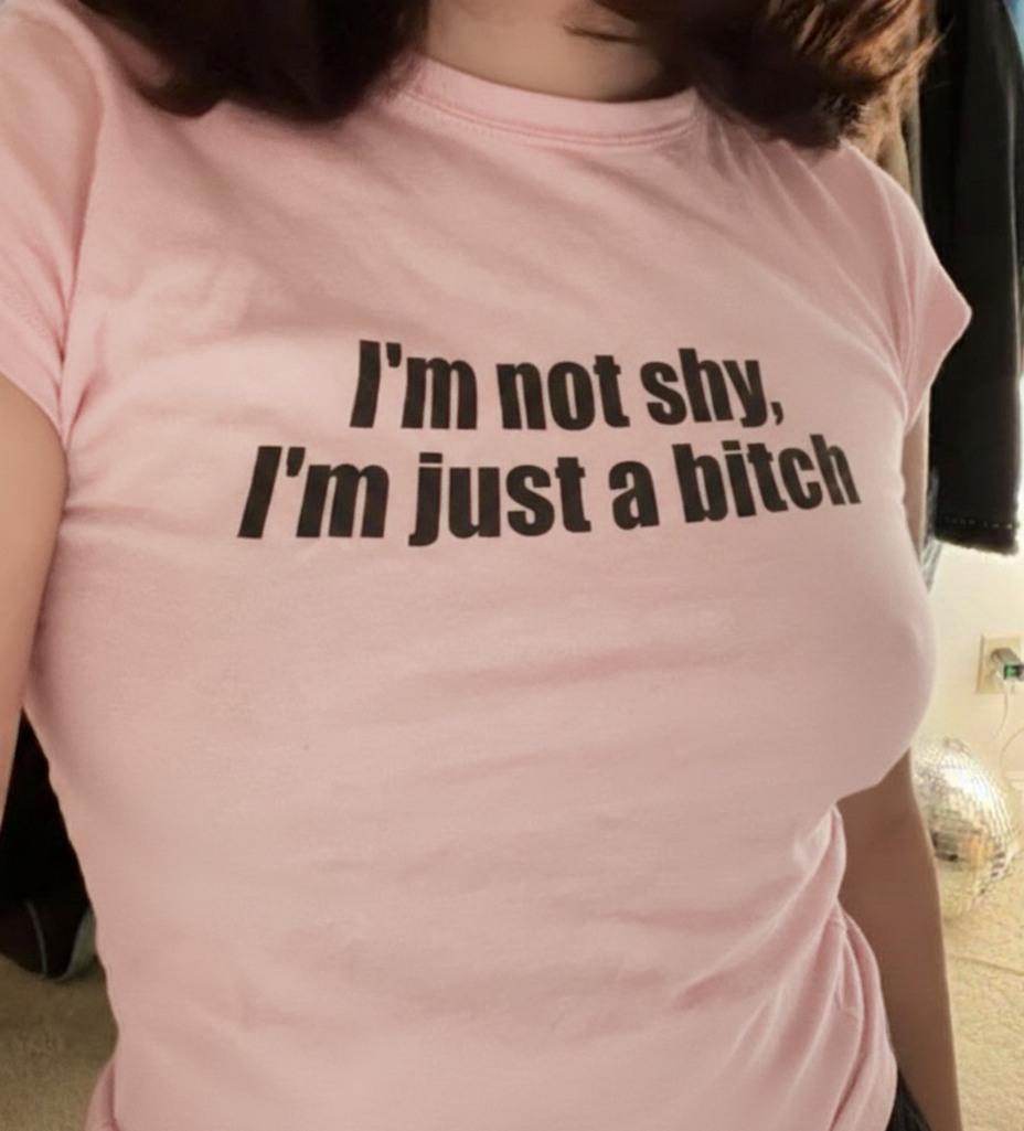 Shy? Nope. baby tee, front view